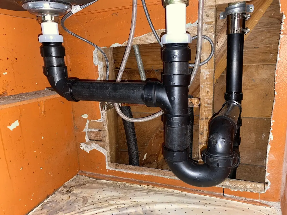 Professional Garbage Disposal Repair equipment and tools on the job in Maryland Heights